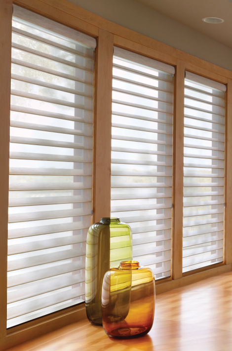 non-motorized window treatments