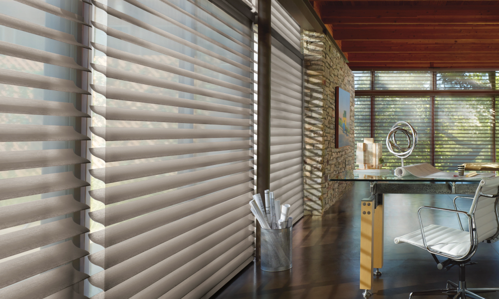 <span class="uk-h4">Commercial window shades in a modern Pittsburgh office with custom solar roller shades for glare and light control</span>